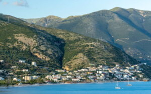 Qeparo village perched on the hillside above the Albanian Riviera coastline, southern Albania