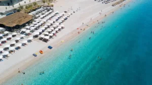 **Palasa** ``` Palasa beach below limestone cliffs on the Albanian Riviera, one of Albania's quietest coastal spots
